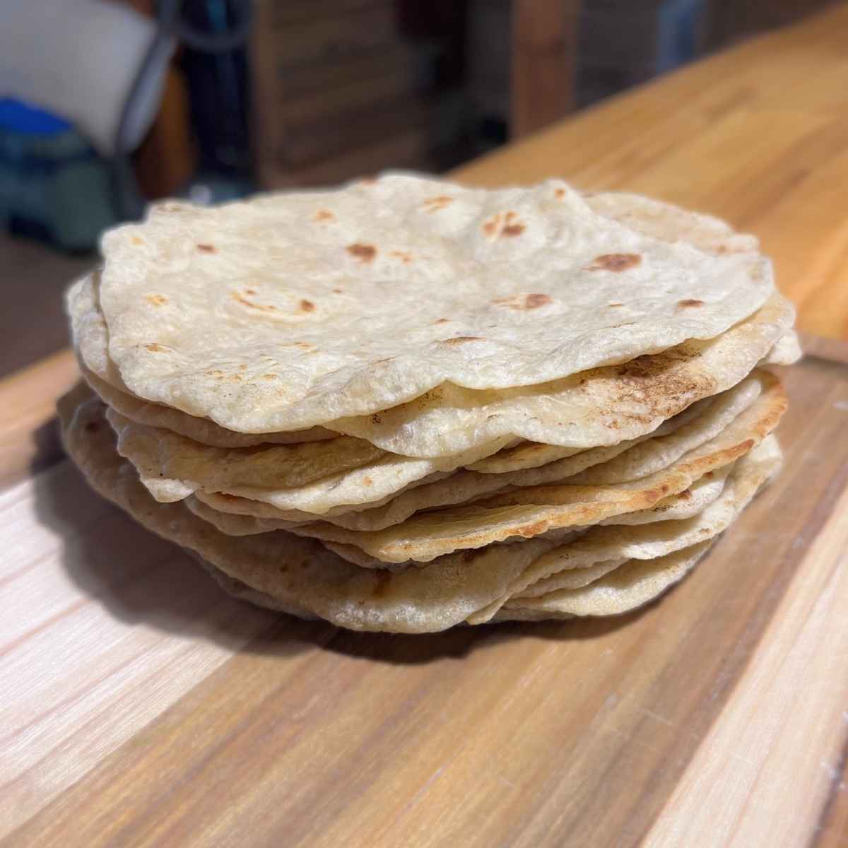 Stack of soft homemade flour tortillas made with sourdough discard, LID-safe and thyroid cancer diet friendly